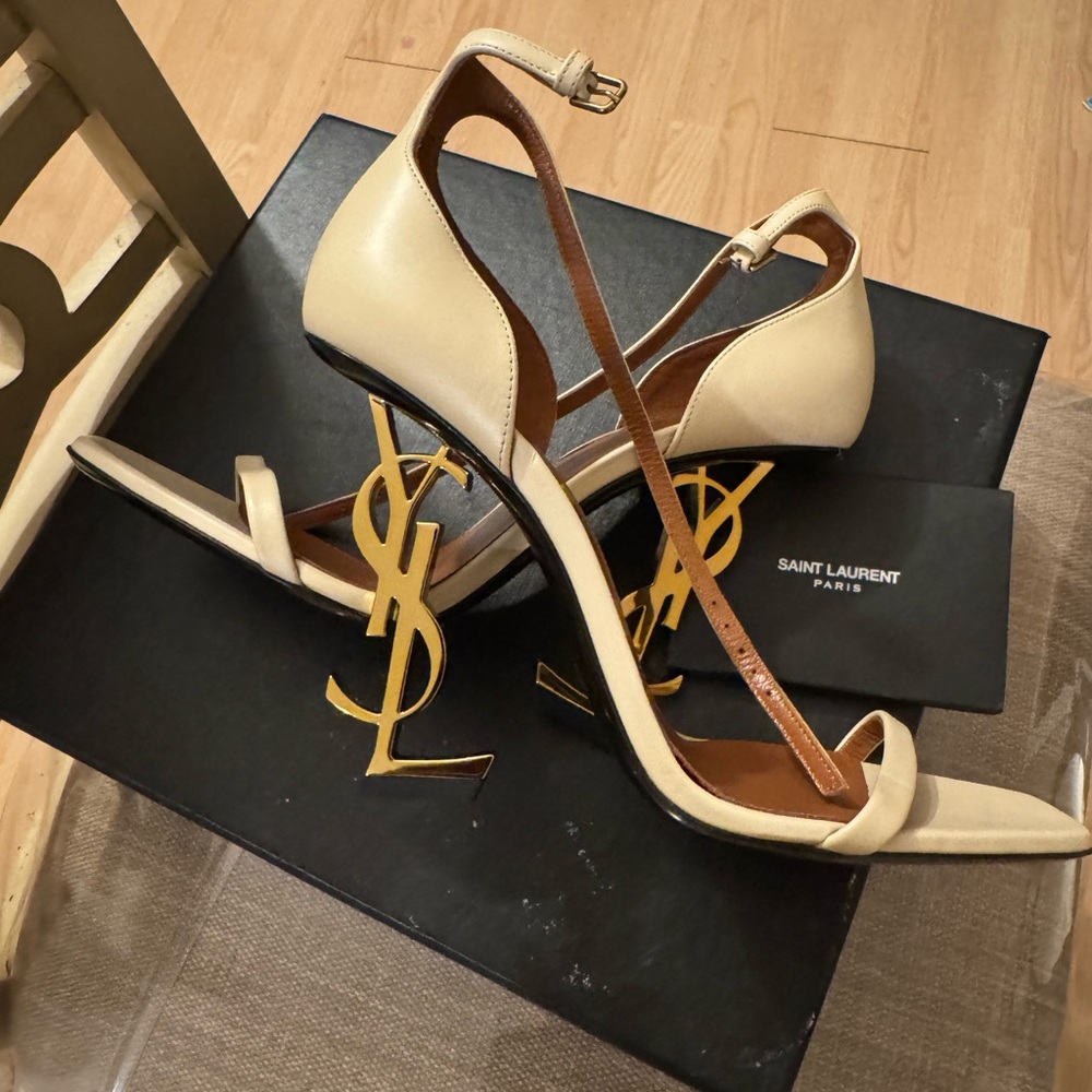 Saint Laurent Beige Heels with Gold Logo Accent